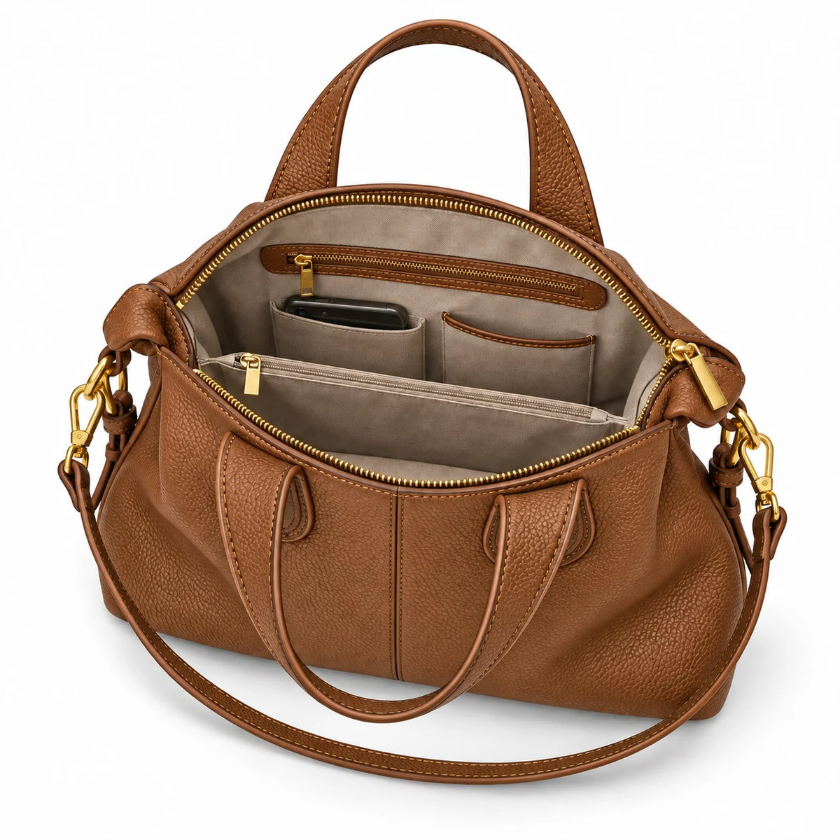 Interior organizado da bolsa feminina de couro marrom