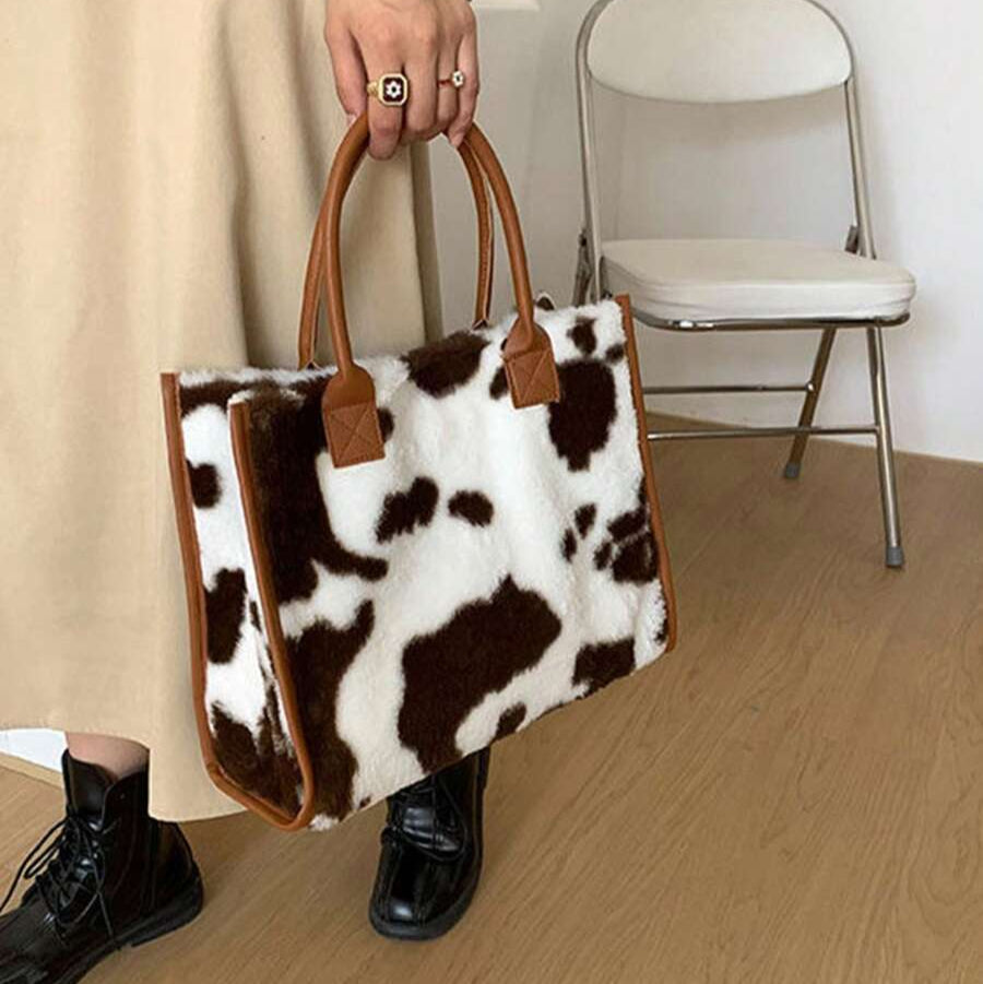 Bolsa Animal Print Pelucia